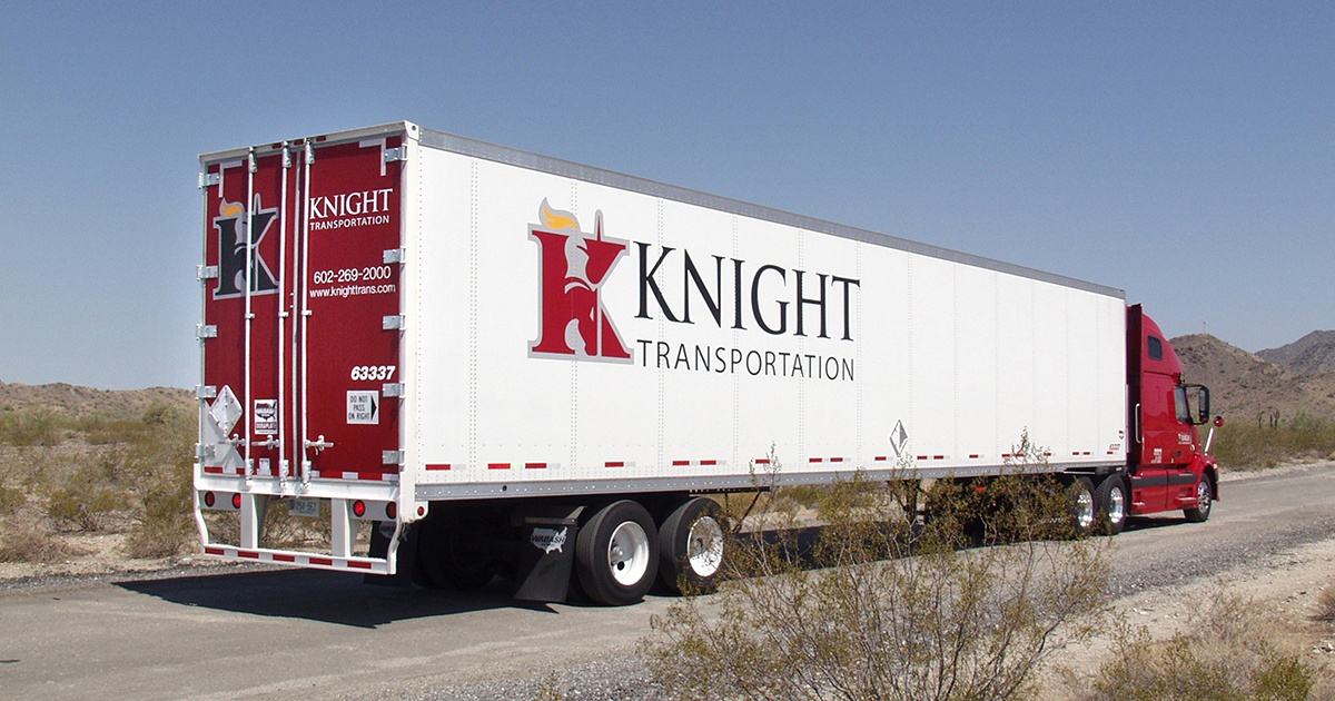 Red Semi Truck and Trailer on Road - Knight Transportation