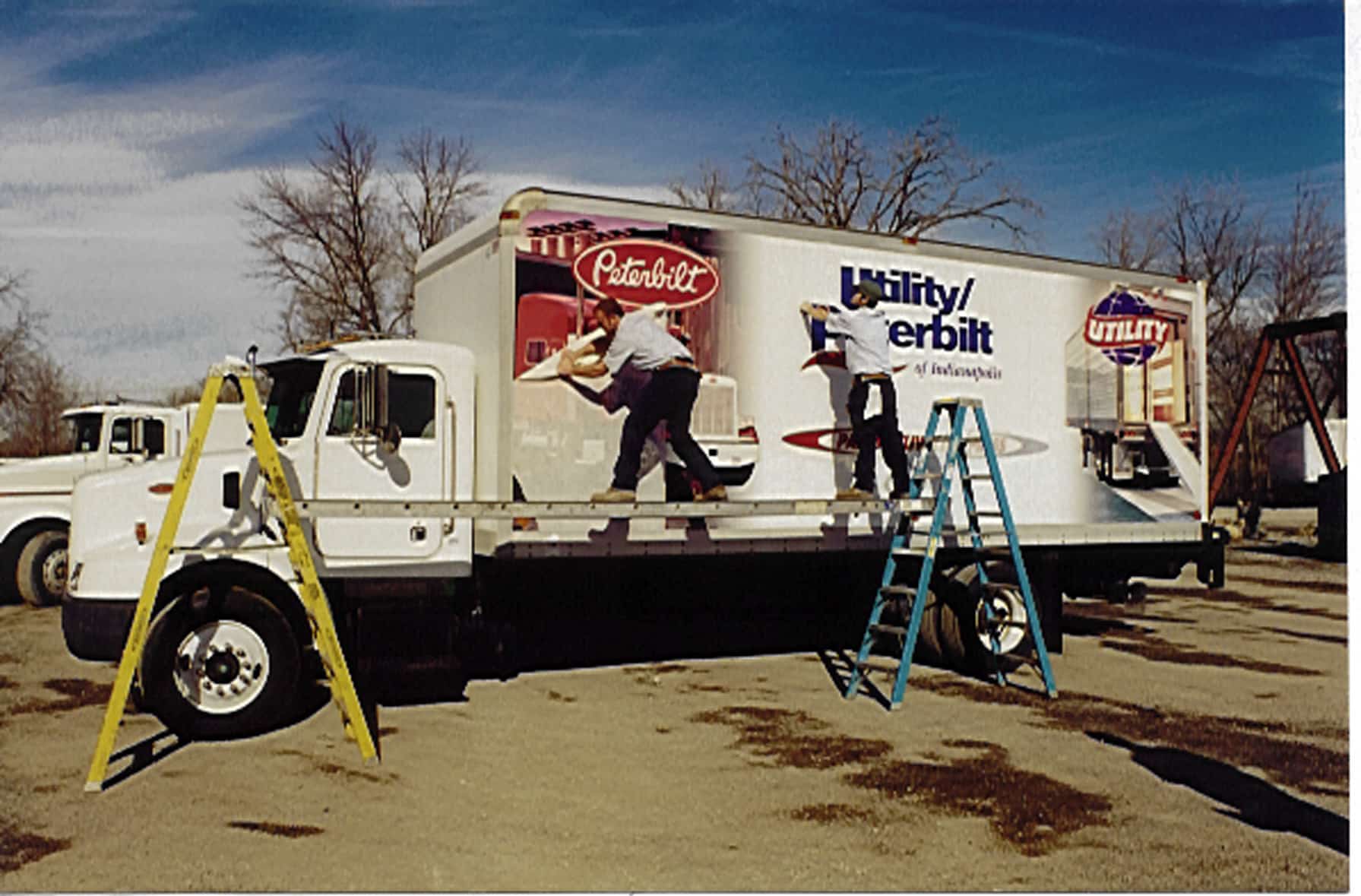 White box truck for Cider Co. displaying fleet graphics in an Atlanta, GA parking lot.