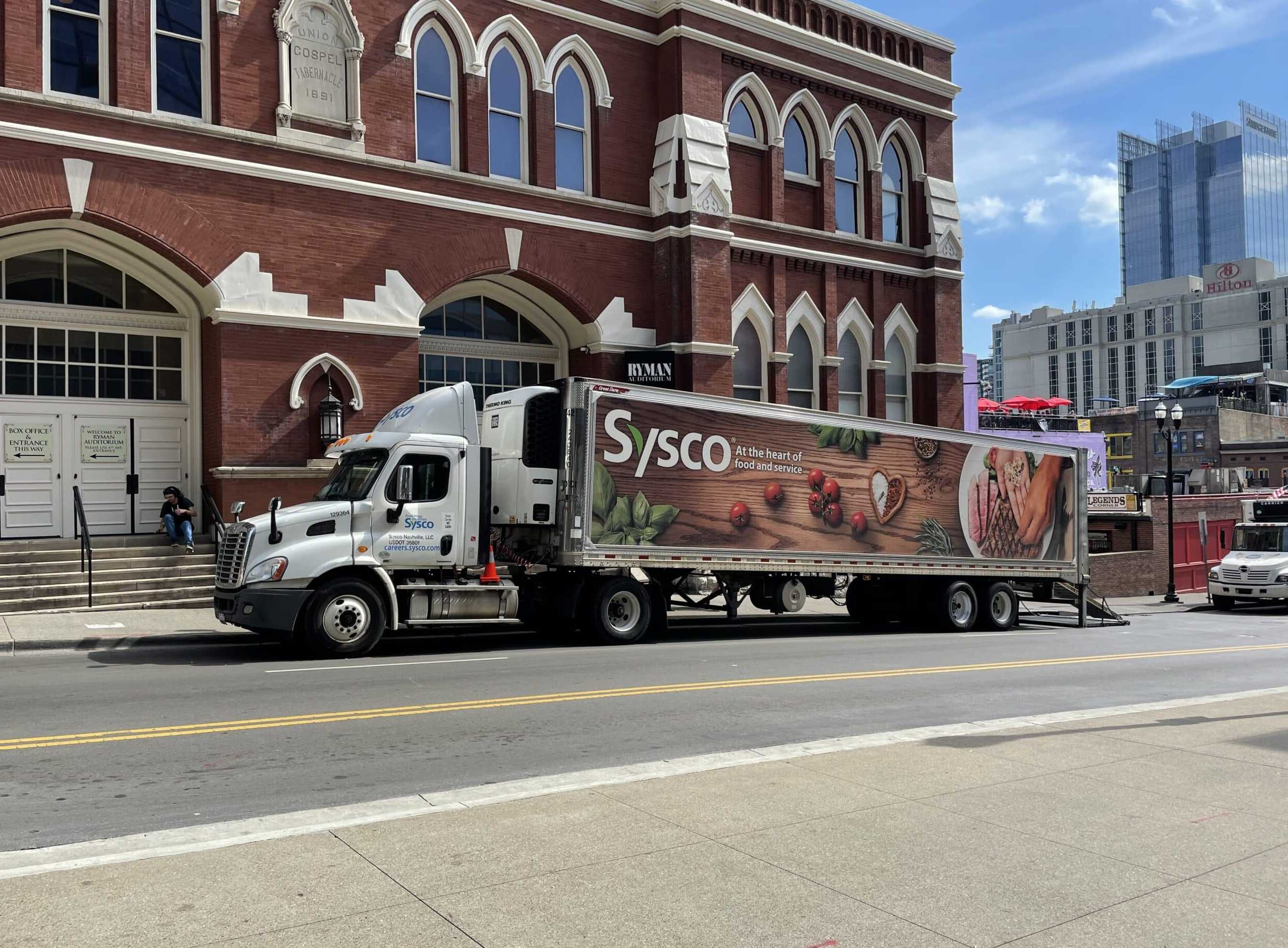 White box truck for Cider Co. displaying fleet graphics in an Atlanta, GA parking lot.